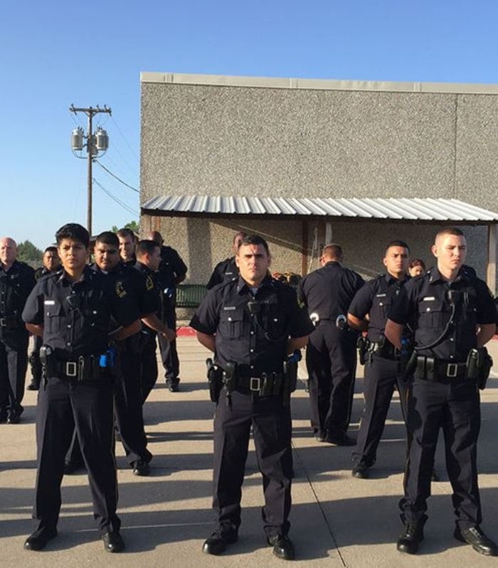 Image of a group of Dallas Police officers standing in formation